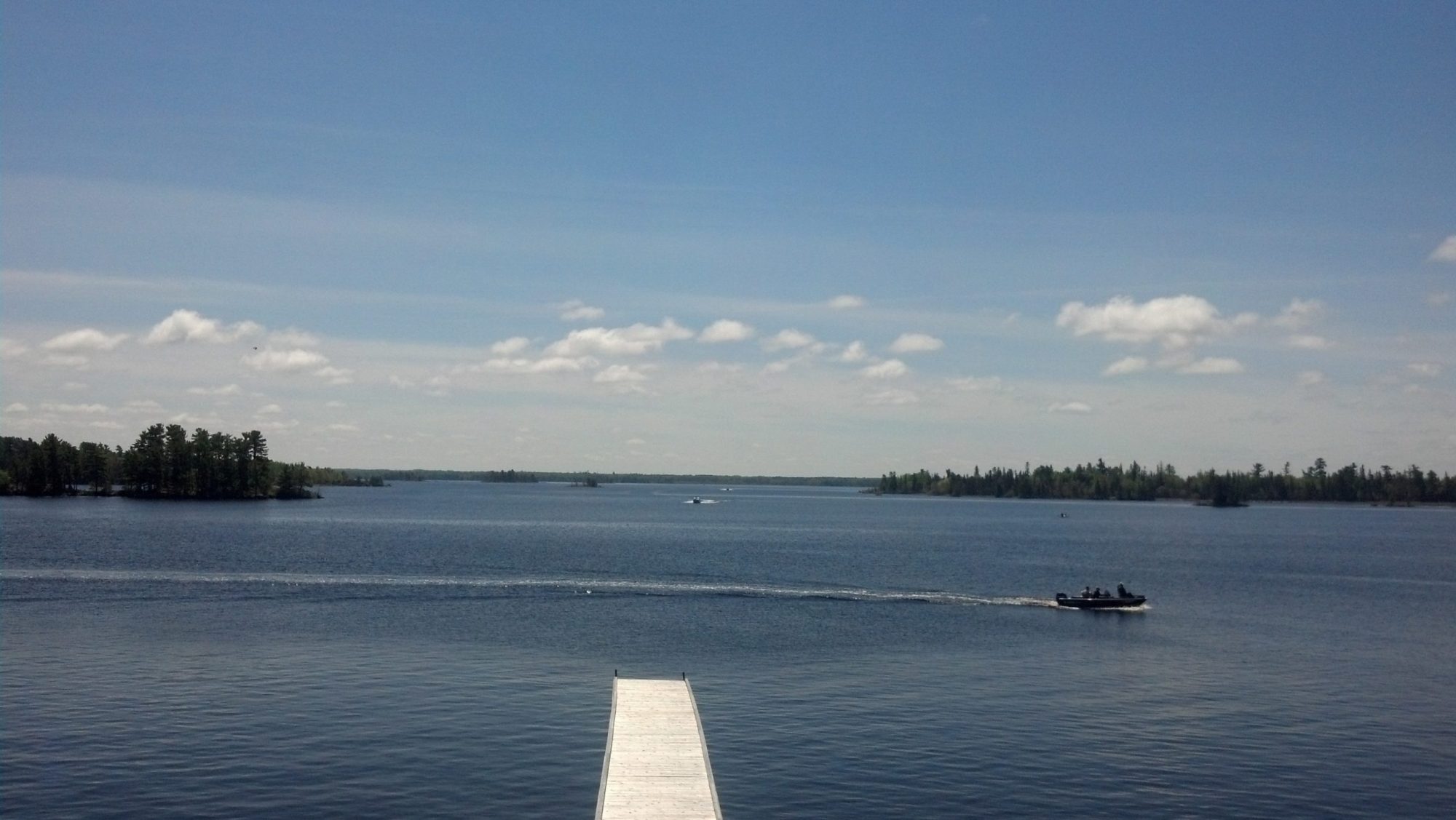 a small boat in a large body of water